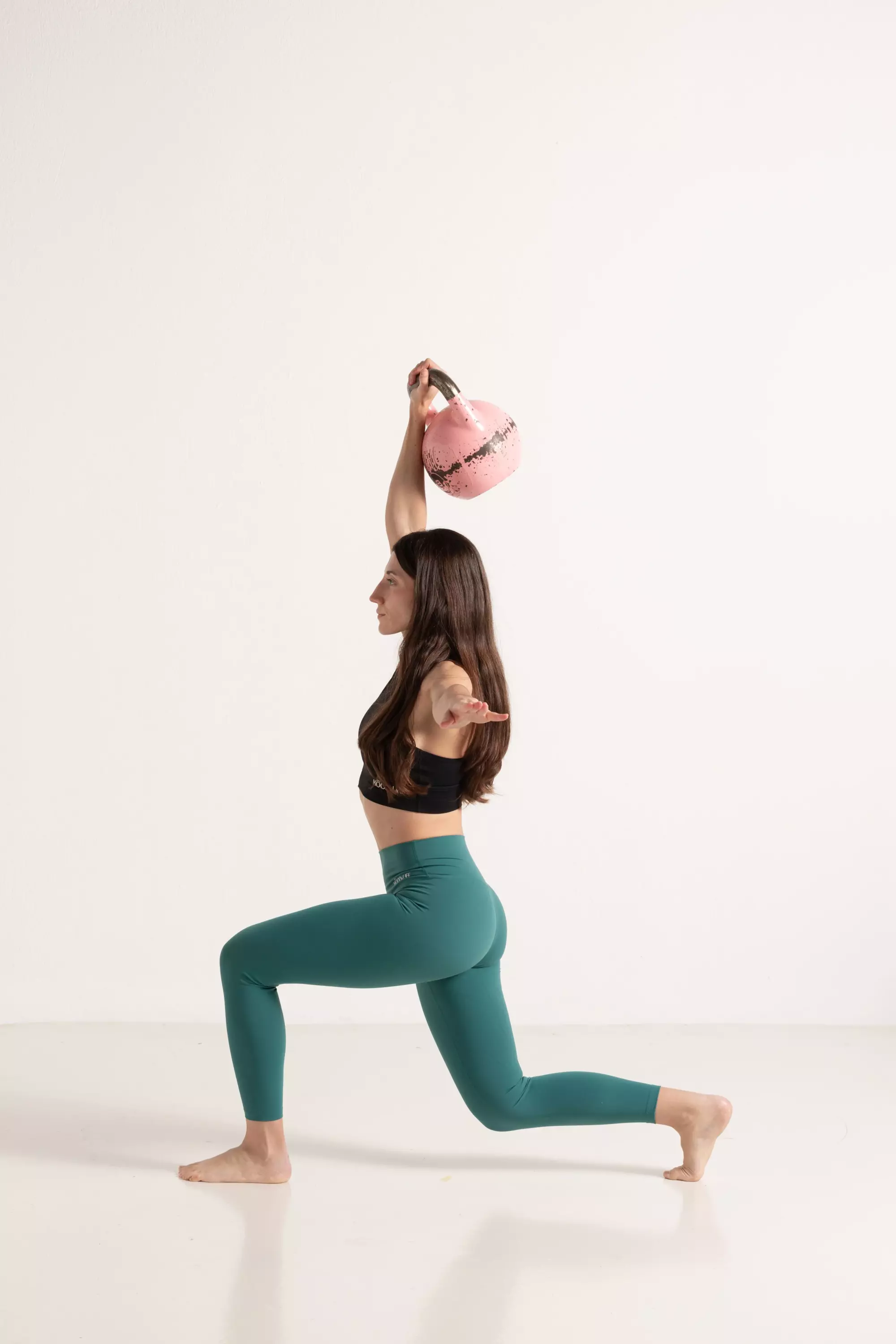 Functional strength training with a kettlebell in a small group